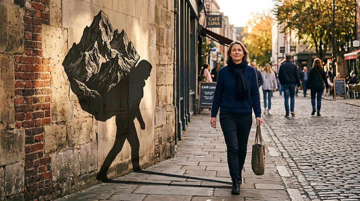 woman carrying heavy bag and getting sore